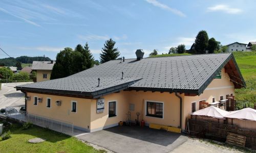 Gasthaus mit Weckman Dach